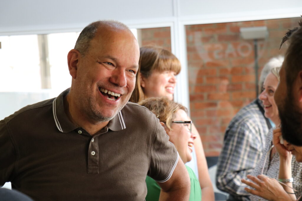 Talking and laughing at Tea & Toast in Winchester