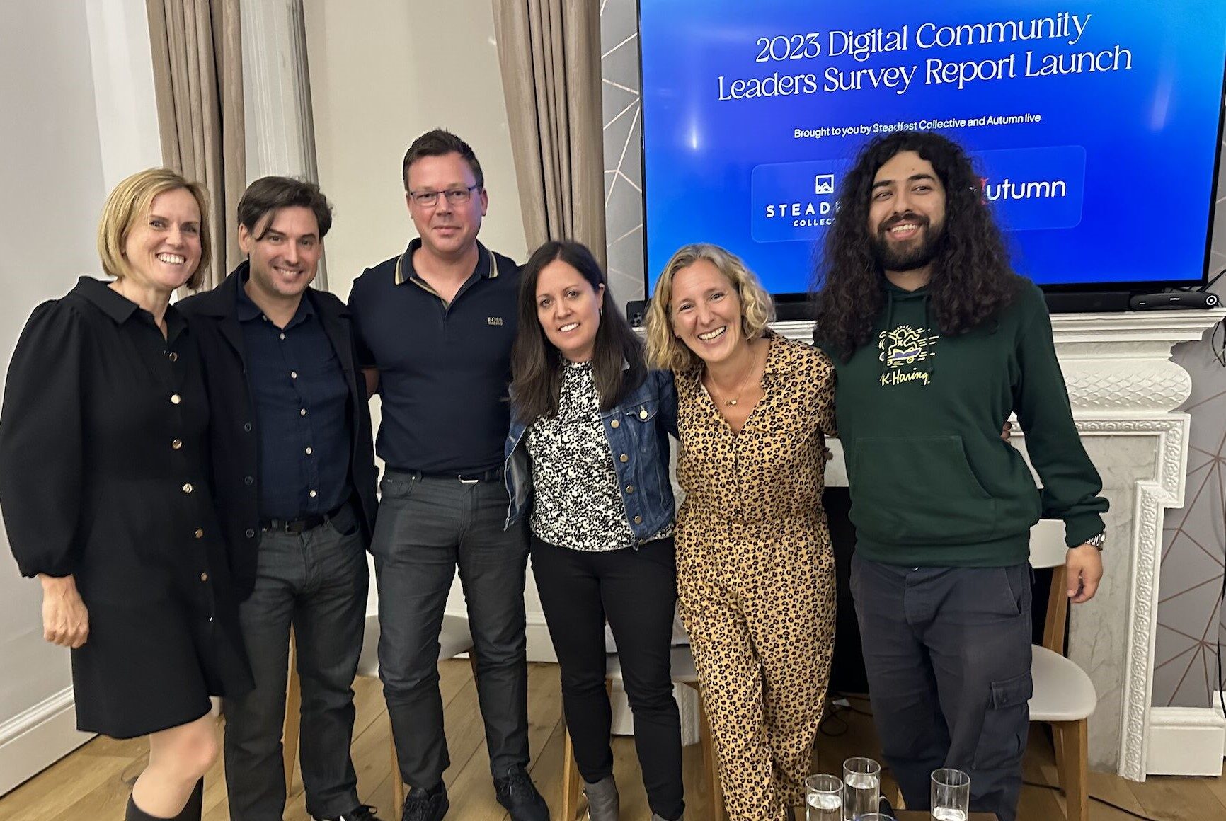 Picture of 6 panelists standing in a row from Left to Right: Madeleine Milne, Blaise Grimes-Viort, Richard Gott, Laura Roth, Michelle Goodall, Kian Bakhtiari