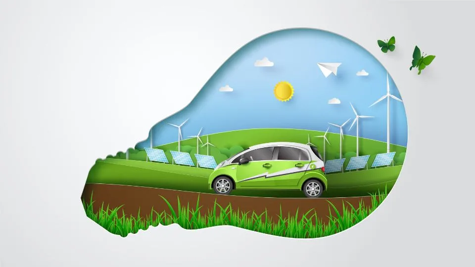 Sustainability and travel graphic showing a car inside a lightbulb shape with wind and solar energy generators behind it