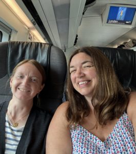 jan and kate eurostar image of two women sitting in train seats facing the camera and smiling